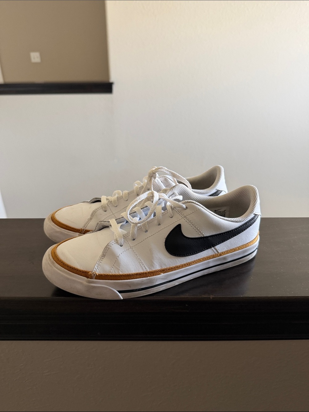 Nike Court Legacy White Low-Top Sneakers with Black Swoosh and Brown Accent